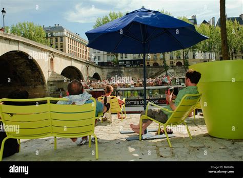 Crowd Of People Enjoying Paris Plages Urban Beach On Seine River Paris