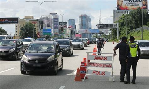 Polis Adakan Sekatan Jalan Raya Sebagai Langkah Siap Siaga Suara Merdeka