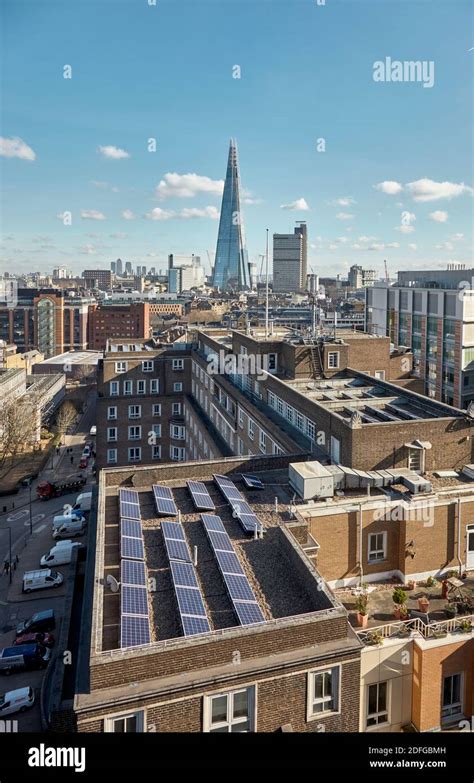 Solar Panels On The Roof Of Lse Bankside House With The Shard In The