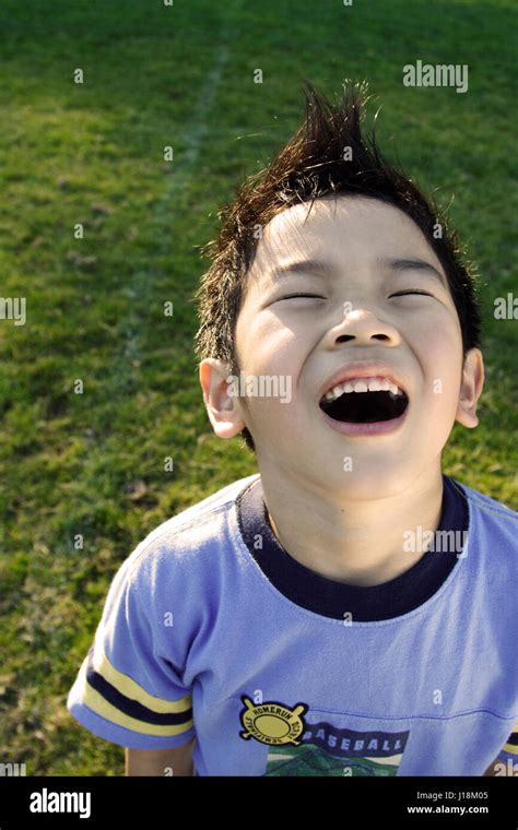 A happy kid playing outdoor Stock Photo - Alamy