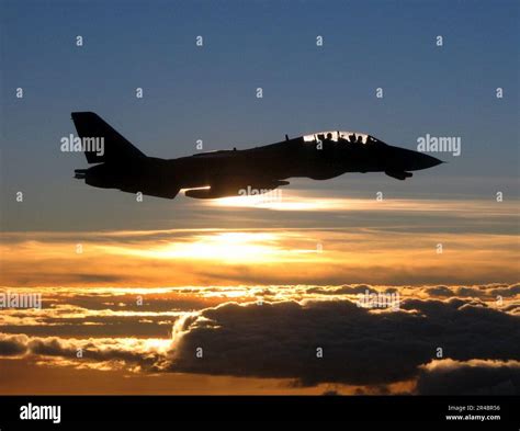 Us Navy An F 14d Tomcat Conducts A Mission Over The Persian Gulf Stock