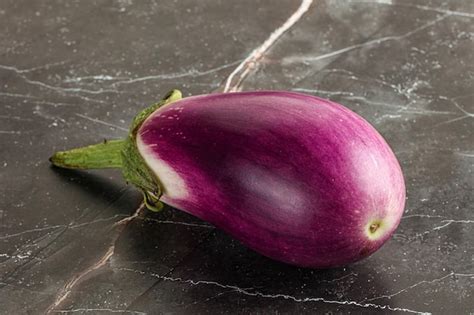 Premium Photo Raw Purple Ripe Eggplant For Cooking Over Background