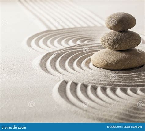 Focus On Balancing Stones In Sand For Progression Stock Photo Image