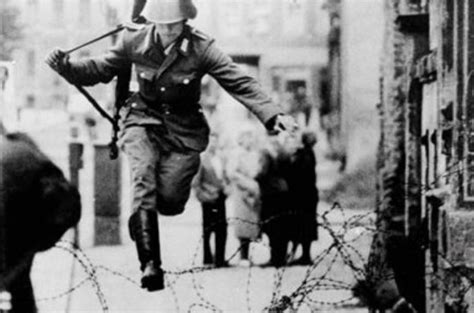 East German Border Guard Conrad Schumann Defecting To West Berlin In