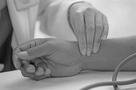 Premium Photo Cropped Image Of Female Doctor Examining Patient In