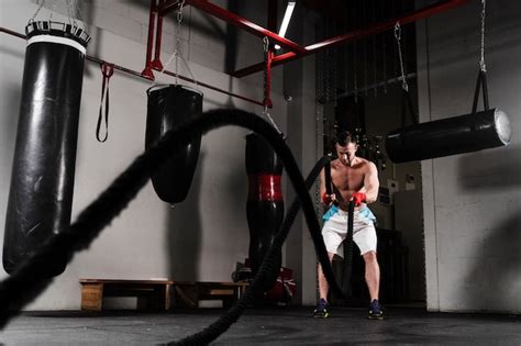 Free Photo Long Shot Strong Man Training For Boxing Competition