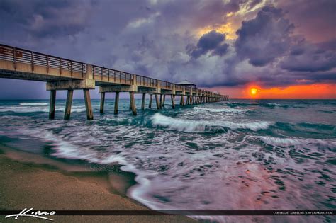 Juno Beach Pier Sunrise Storm Breaking Wave Royal Stock Photo