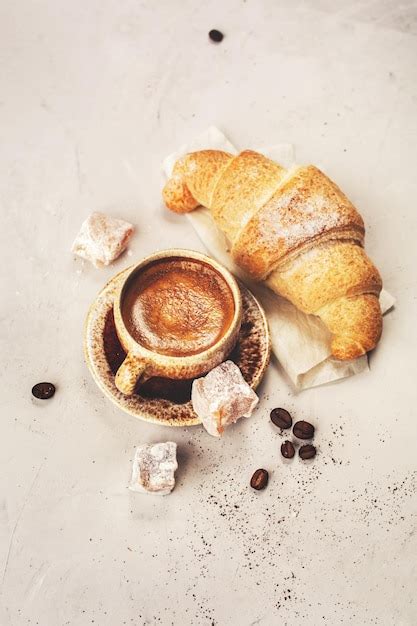 Premium Photo | Coffee and croissants