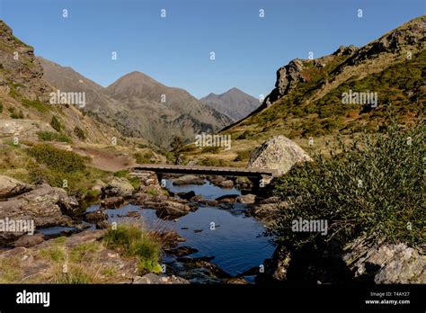 Wooden Bridge In The Hiking Trail Estanys De Tristaina Pyrenees