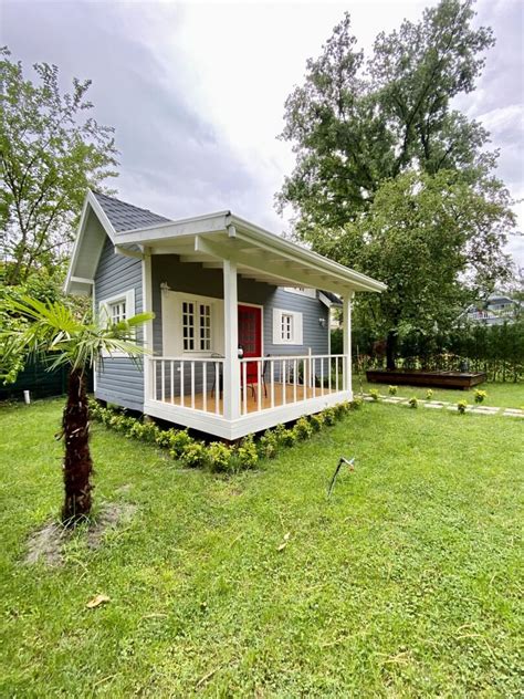 Classic Tiny House With Red Door