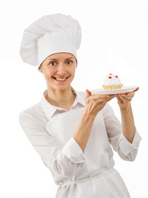 Cocinero Hermoso Del Cocinero De La Mujer Que Muestra Una Torta Imagen