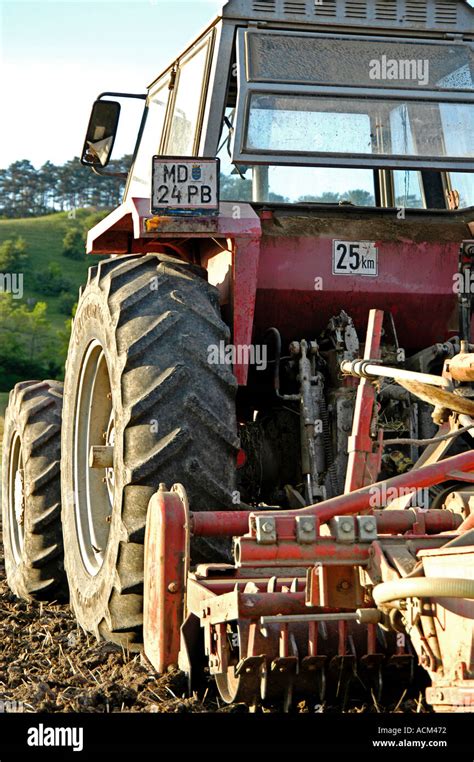 tractor plowing  field tractor   plow stock photo alamy