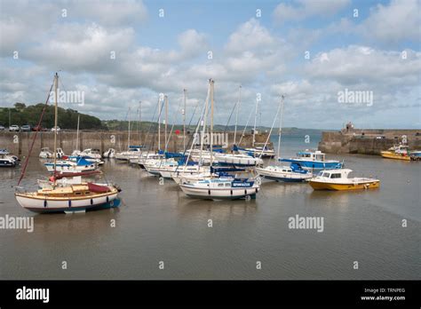 Boats Moored In The Harbour At Saundersfoot Pembrokeshire Wales Stock