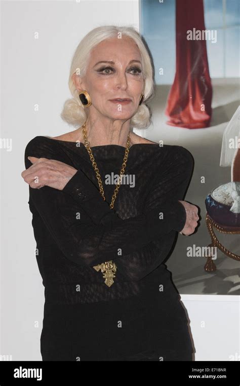 Model Carmen Dellorefice Poses With Picture Of Herself Taken By Horst