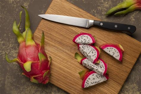 Dragon Fruit Pitaya Pitahaya Cut Into Slices On A Wooden Board Stock