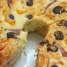 A Close Up Of A Cake On A Pan With One Slice Cut Out And Ready To Be Eaten