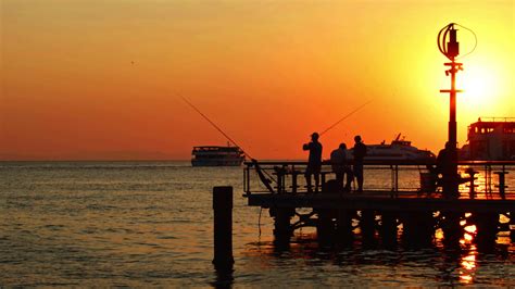 Fishermen at Sunset 12294789 Stock Video at Vecteezy