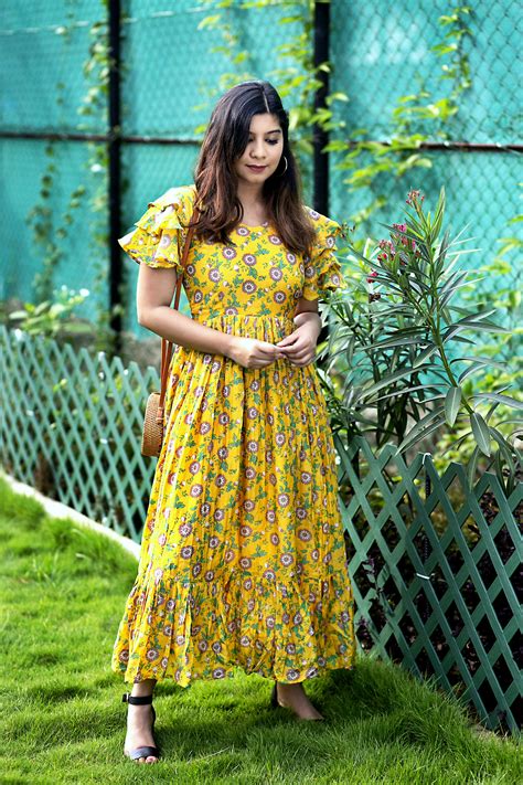 Mustard yellow floral printed ruffle dress by Athira Designs | The ...