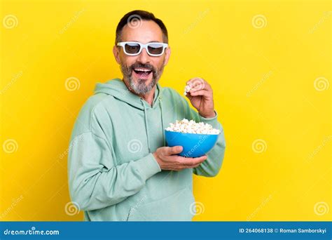 Photo Of Eating Popcorn Old Retired Brunet Hair Mature Age Man Wear Khaki Sweatshirt Open Mouth
