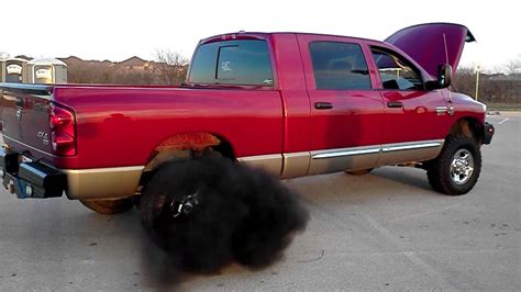 6 7l Cummins Efi Live Rolling Coal Youtube