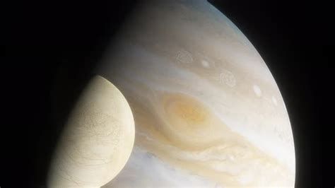 Ice Moon Europa on the Background of the Large Gas Planet Jupiter ...