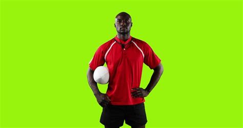 Portrait Of African American Male Rugby Player With Ball Copy Space On