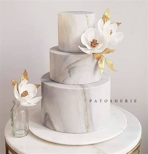 Here Is The Finished Marble Cake With Added Gold Touches Made For The Sweetest And Chic Couple