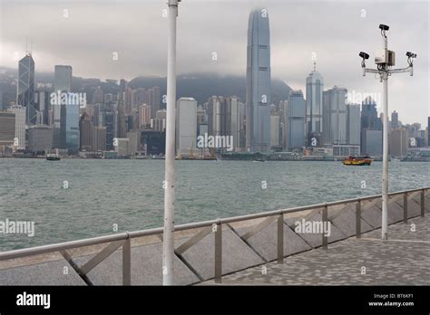 Tsim Sha Tsui waterfront with Victoria Harbour skyline Stock Photo - Alamy