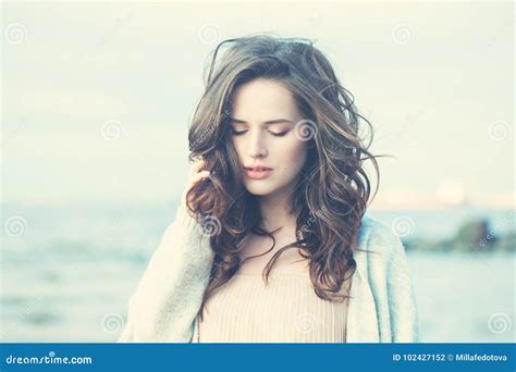 Beautiful Brunette Girl With Blowing Hair Stock Photo Image Of Curly Makeup