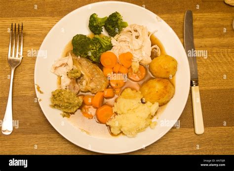 Roast Chicken And Vegetables For Traditional British Sunday Dinner On