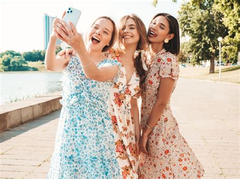 Free Photo Three Beautiful Smiling Girls In Trendy Summer Sundress