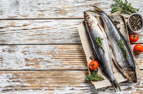 Premium Photo Pickled Nordic Herring Ion A Wooden Plate