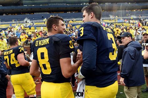 Jim Harbaugh doesn't know his starting QB yet, though he wouldn't tell anyway - mlive.com