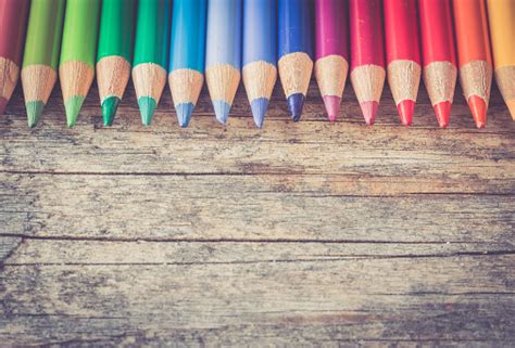 Creativity Colored Pencils In A Can On Rustic Wooden Table White