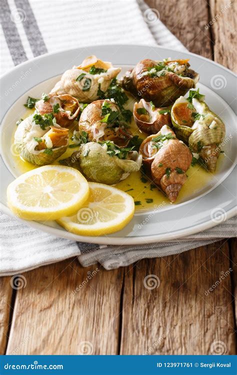 Seafood Whelk Sea Snails Bulot With A Sauce Of Butter Garlic Royalty