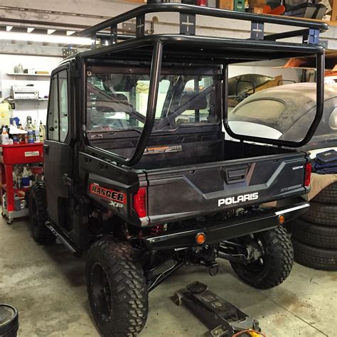 Roll Cage Roof And Safari Rack Installed On A Polaris Ranger 900xp