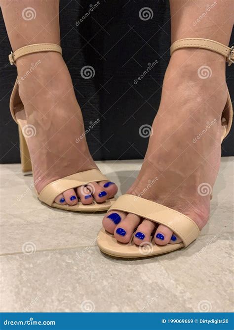 Woman Standing Indoors In Nude Beige High Heel Sandals Stock Image Image Of Feetmodel Blue