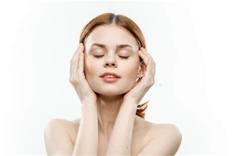 Pretty Woman Naked Shoulders Cosmetics Smile Hands Near Face Stock