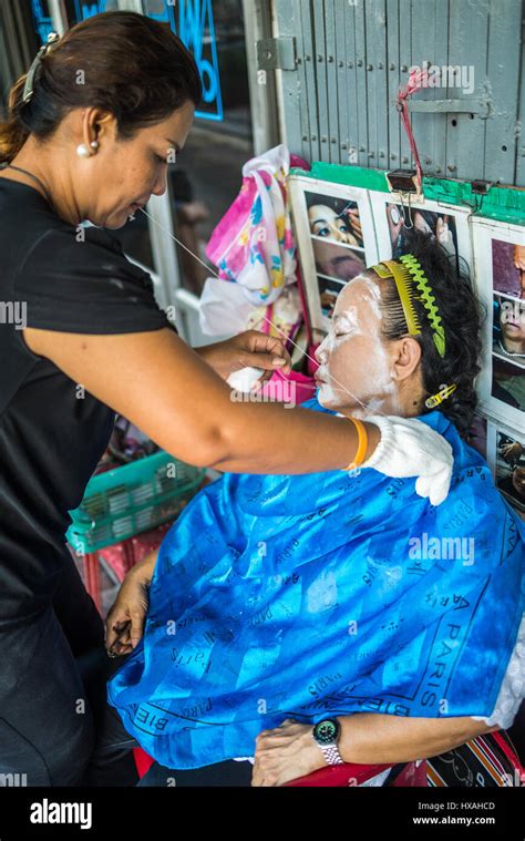 Facial Epilation With The Ancient Method Of Threading In China Town