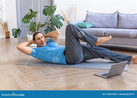 Middle Aged Man Practicing Abs Crunches Training Abdominal Muscles On