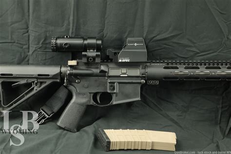 Armalite M15 5.56 18.5” Barrel Semi Auto Rifle W/ Accessories - Wyoming ...