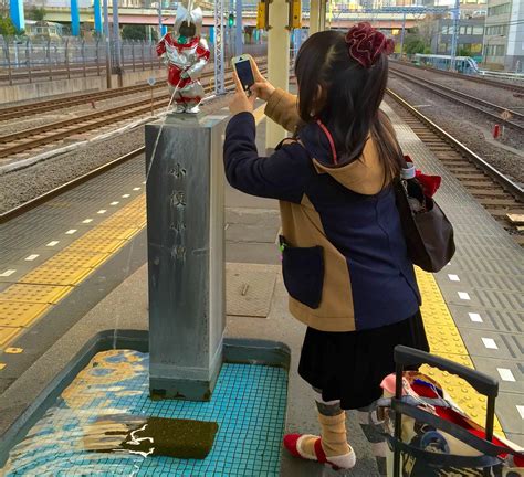 Peeing Ultraman And A Cute Japanese Girl Taking A Snap Flickr