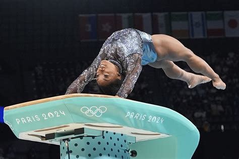 Simone Biles shakes off a calf injury to dominate during Olympic ...