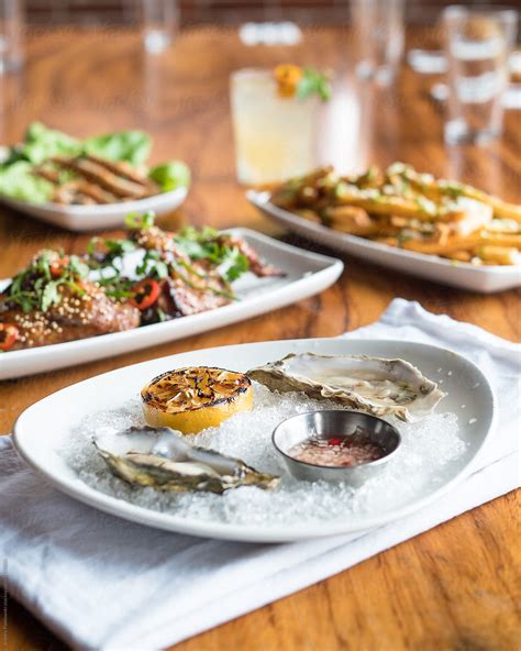 Raw Oyster Appetizer By Stocksy Contributor J Anthony Stocksy