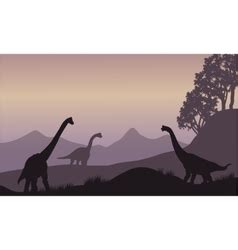 Silhouette Two Brachiosaurus At Sunset Royalty Free Vector