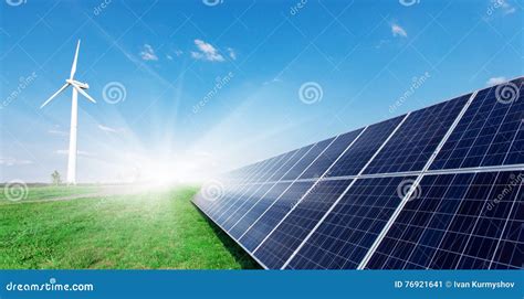 Windmill And Solar Panels On Blue Sky At Daytime Stock Image Image Of