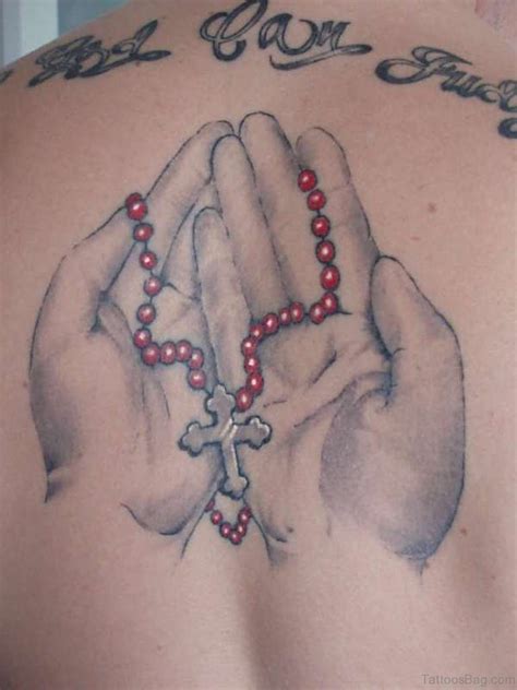 77 Elegant Praying Hands Tattoos On Back Tattoo Designs