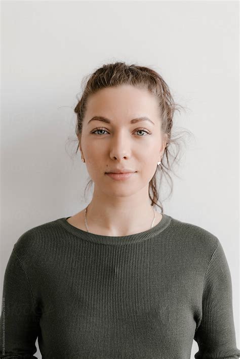 «portrait Shoot Of Beautiful Young Woman Against Green Wall Del