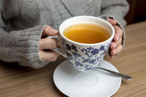 Hand Holding Tea Cup Stock Photos Pictures Royalty Free Images