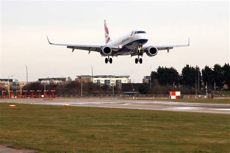 British Airways Cityflyer Embraer aircraft landing at London City Airport. | British airways ...